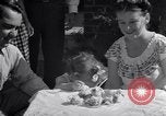 Image of first birthday of Nancy Gayle born to dwarf parents Austin Texas USA, 1950, second 62 stock footage video 65675038032