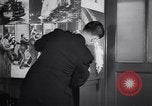 Image of men use typewriters in newspaper news room United States USA, 1938, second 33 stock footage video 65675038059
