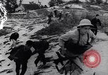 Image of Vietcong soldier action Vietnam War Vietnam, 1966, second 19 stock footage video 65675038094