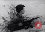 Image of Vietcong soldier action Vietnam War Vietnam, 1966, second 40 stock footage video 65675038094