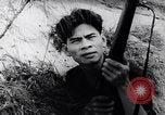 Image of Vietcong soldier action Vietnam War Vietnam, 1966, second 42 stock footage video 65675038094