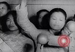 Image of North Vietnamese propaganda meeting Vietnam, 1966, second 8 stock footage video 65675038097
