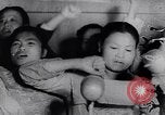 Image of North Vietnamese propaganda meeting Vietnam, 1966, second 9 stock footage video 65675038097