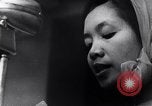 Image of North Vietnamese propaganda meeting Vietnam, 1966, second 32 stock footage video 65675038097