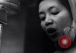 Image of North Vietnamese propaganda meeting Vietnam, 1966, second 34 stock footage video 65675038097