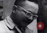 Image of North Vietnamese propaganda meeting Vietnam, 1966, second 35 stock footage video 65675038097