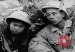 Image of North Vietnamese Vietcong soldiers at war Vietnam, 1966, second 43 stock footage video 65675038098