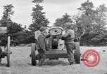 Image of German POW explains artillery to American soldier France, 1944, second 30 stock footage video 65675038185