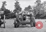 Image of German POW explains artillery to American soldier France, 1944, second 31 stock footage video 65675038185