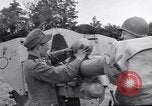 Image of German POW explains artillery to American soldier France, 1944, second 44 stock footage video 65675038185