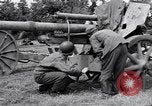 Image of German POW explains artillery to American soldier France, 1944, second 54 stock footage video 65675038185
