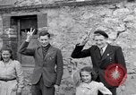 Image of 1st Infantry march past church of Sainte Marie du Mont Sainte Marie du Mont France, 1944, second 43 stock footage video 65675038186
