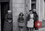 Image of 1st Infantry march past church of Sainte Marie du Mont Sainte Marie du Mont France, 1944, second 45 stock footage video 65675038186