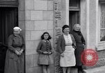 Image of 1st Infantry march past church of Sainte Marie du Mont Sainte Marie du Mont France, 1944, second 46 stock footage video 65675038186