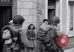 Image of 1st Infantry march past church of Sainte Marie du Mont Sainte Marie du Mont France, 1944, second 48 stock footage video 65675038186