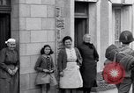 Image of 1st Infantry march past church of Sainte Marie du Mont Sainte Marie du Mont France, 1944, second 51 stock footage video 65675038186