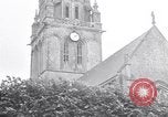 Image of 1st Infantry march past church of Sainte Marie du Mont Sainte Marie du Mont France, 1944, second 54 stock footage video 65675038186