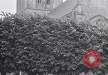 Image of 1st Infantry march past church of Sainte Marie du Mont Sainte Marie du Mont France, 1944, second 55 stock footage video 65675038186