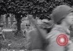 Image of 1st Infantry march past church of Sainte Marie du Mont Sainte Marie du Mont France, 1944, second 57 stock footage video 65675038186