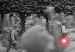 Image of 1st Infantry march past church of Sainte Marie du Mont Sainte Marie du Mont France, 1944, second 60 stock footage video 65675038186