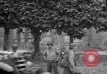 Image of 1st Infantry march past church of Sainte Marie du Mont Sainte Marie du Mont France, 1944, second 61 stock footage video 65675038186