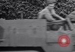 Image of 1st Infantry march past church of Sainte Marie du Mont Sainte Marie du Mont France, 1944, second 62 stock footage video 65675038186