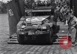 Standbild US-Militär Fahrzeuge geladen auf Invasion Schiffe Portland Head England, 1944, aus Sekunde 43 historischem Filmmaterial Videoclip 65675038189