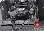 Standbild US-Militär Fahrzeuge geladen auf Invasion Schiffe Portland Head England, 1944, aus Sekunde 50 historischem Filmmaterial Videoclip 65675038189