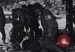 Image of injured soldier France, 1944, second 11 stock footage video 65675038191