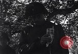 Image of injured soldier France, 1944, second 19 stock footage video 65675038191