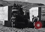 Image of US troops train for D-Day, at Braunton Burrows North Devon England United Kingdom, 1944, second 11 stock footage video 65675038194