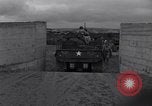 Image of US troops train for D-Day, at Braunton Burrows North Devon England United Kingdom, 1944, second 16 stock footage video 65675038194