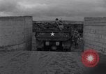 Image of US troops train for D-Day, at Braunton Burrows North Devon England United Kingdom, 1944, second 17 stock footage video 65675038194