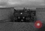 Image of US troops train for D-Day, at Braunton Burrows North Devon England United Kingdom, 1944, second 18 stock footage video 65675038194