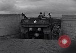Image of US troops train for D-Day, at Braunton Burrows North Devon England United Kingdom, 1944, second 19 stock footage video 65675038194