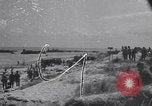 Image of Equipment and reinforcements landing in invasion of France Normandy France, 1944, second 1 stock footage video 65675038225