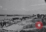 Image of Equipment and reinforcements landing in invasion of France Normandy France, 1944, second 4 stock footage video 65675038225