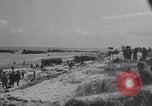 Image of Equipment and reinforcements landing in invasion of France Normandy France, 1944, second 5 stock footage video 65675038225