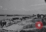 Image of Equipment and reinforcements landing in invasion of France Normandy France, 1944, second 6 stock footage video 65675038225