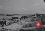 Image of Equipment and reinforcements landing in invasion of France Normandy France, 1944, second 7 stock footage video 65675038225