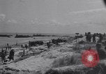 Image of Equipment and reinforcements landing in invasion of France Normandy France, 1944, second 8 stock footage video 65675038225