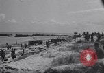 Image of Equipment and reinforcements landing in invasion of France Normandy France, 1944, second 9 stock footage video 65675038225