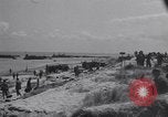 Image of Equipment and reinforcements landing in invasion of France Normandy France, 1944, second 10 stock footage video 65675038225