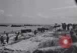 Image of Equipment and reinforcements landing in invasion of France Normandy France, 1944, second 11 stock footage video 65675038225