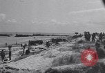 Image of Equipment and reinforcements landing in invasion of France Normandy France, 1944, second 12 stock footage video 65675038225