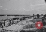 Image of Equipment and reinforcements landing in invasion of France Normandy France, 1944, second 14 stock footage video 65675038225
