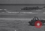 Image of Equipment and reinforcements landing in invasion of France Normandy France, 1944, second 16 stock footage video 65675038225