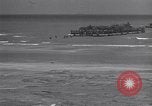 Image of Equipment and reinforcements landing in invasion of France Normandy France, 1944, second 20 stock footage video 65675038225