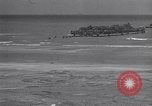 Image of Equipment and reinforcements landing in invasion of France Normandy France, 1944, second 21 stock footage video 65675038225