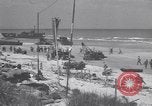Image of Equipment and reinforcements landing in invasion of France Normandy France, 1944, second 31 stock footage video 65675038225
